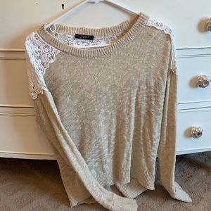 Beige and floral sweater